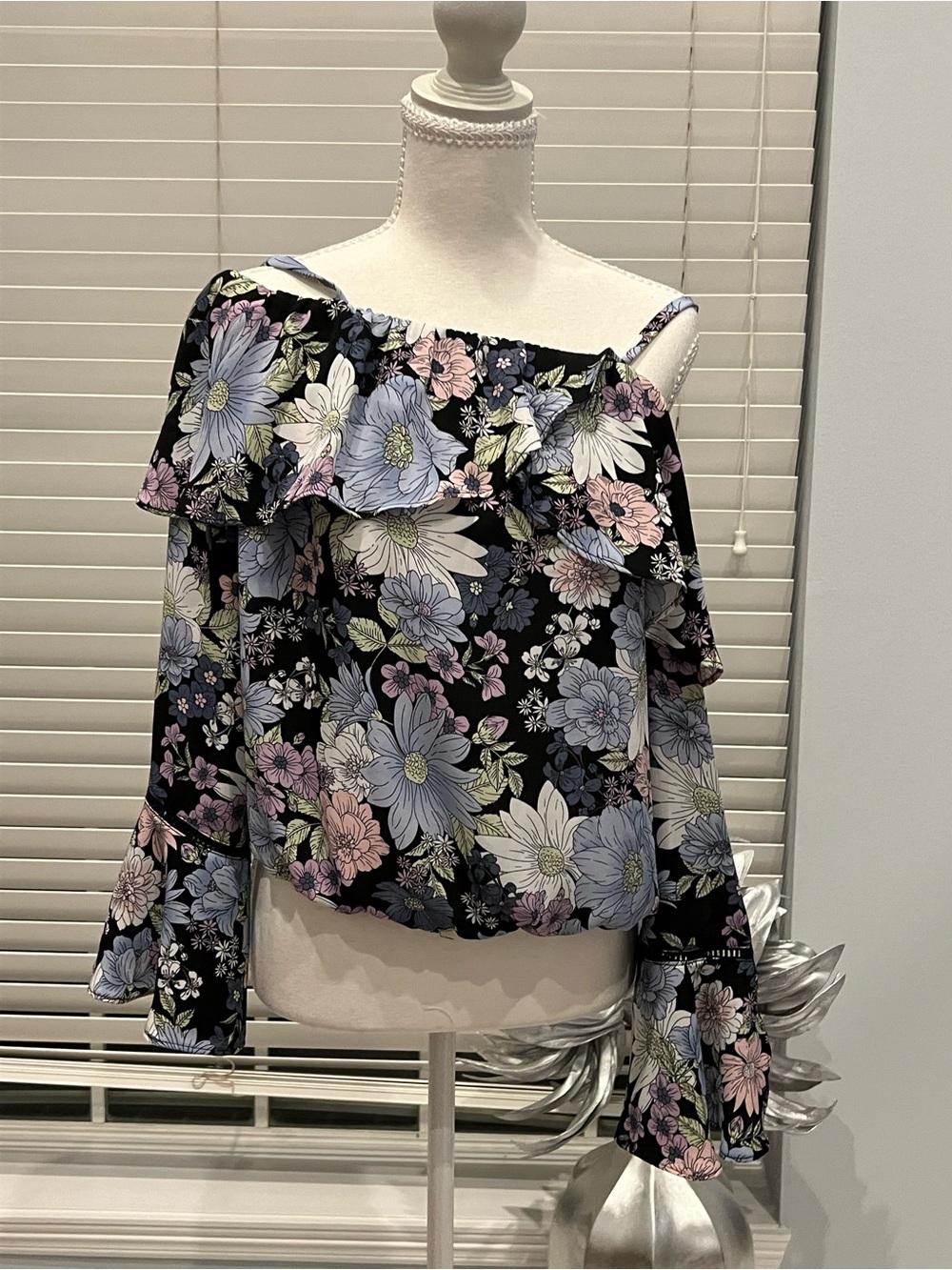 BCX Black Floral One-Shoulder Ruffle Blouse with Pastel Blooms